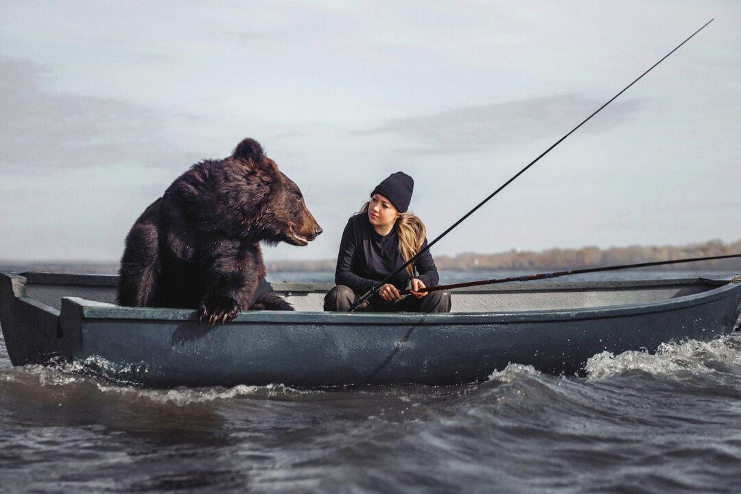 Russian Woman Befriends Bear That She Rescued From Safari Park, Now They Go Fishing Together