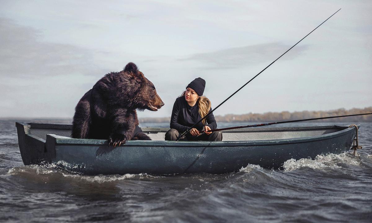 Russian Woman Befriends Bear That She Rescued From Safari Park, Now They Go Fishing Together