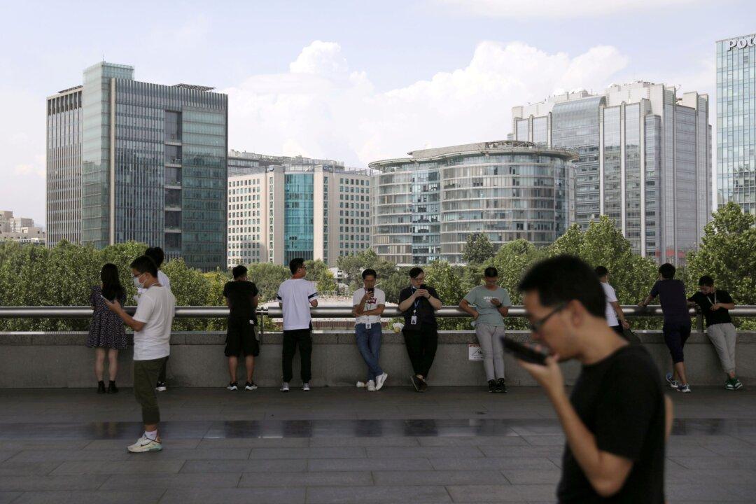 Not My Pay! Some Tech Workers Bemoan China’s Crackdown on Compulsory Overtime