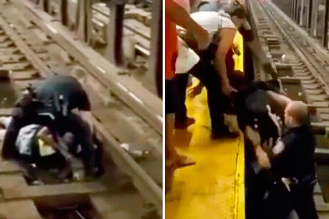 NYPD Officer Saves Man, 60, Who Collapsed onto Subway Tracks Seconds Before Train Arrives