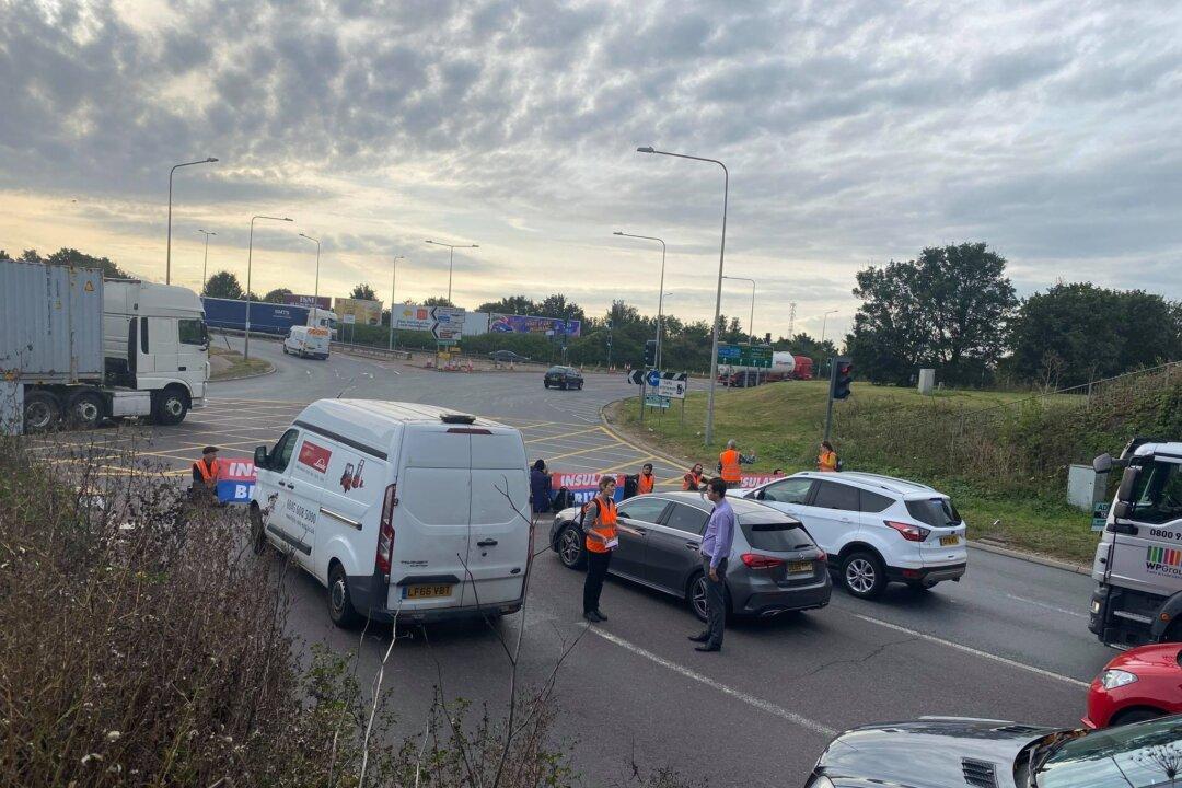 Police Arrest Environmentalists Who Blocked UK Motorway Over Home Insulation