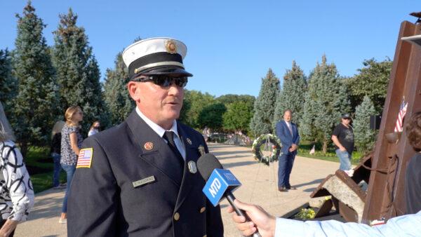 Eric Woodring, the Deputy Chief of Warrington Fire Co., says it would be nice to "have that sense of pride in our nation," at the Garden of Reflection in Lower Makefield Township, Pa., on Sept. 11, 2021. (William Huang/The Epoch Times)