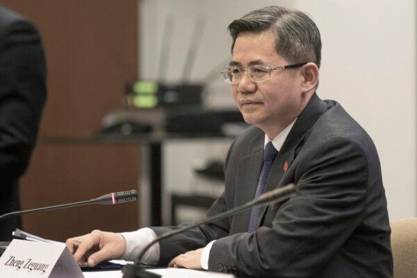 Zheng Zeguang, then China's assistant minister of foreign affairs, is seen speaking at a news conference in Chicago, on Dec. 18, 2014. (AP Photo/Teresa Crawford)