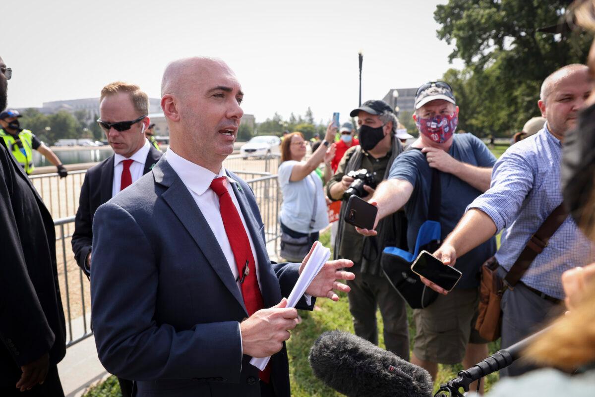 Matt Braynard, executive director of 'Look Ahead America,' speaks to the press at an event supporting equal treatment under the law for non-violent charged over Jan. 6 protests at the 'Justice for J6' rally near the U.S. Capitol in Washington on Sept. 18, 2021. (Tasos Katopodis/Getty Images)