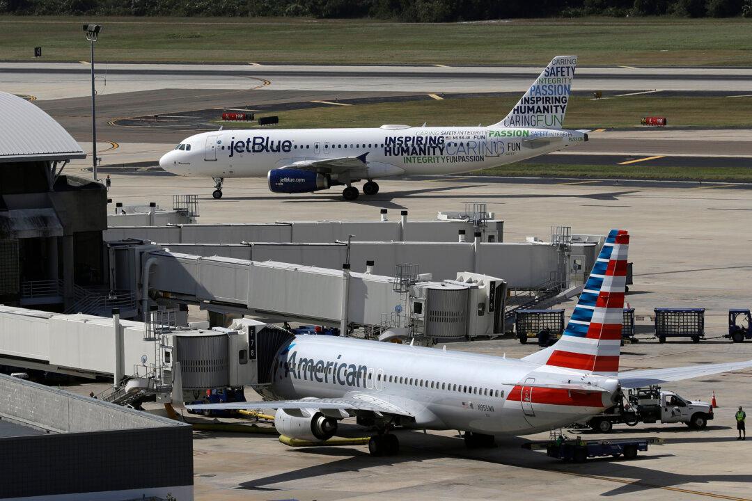 Justice Department Sues to Block JetBlue, American Airlines Alliance