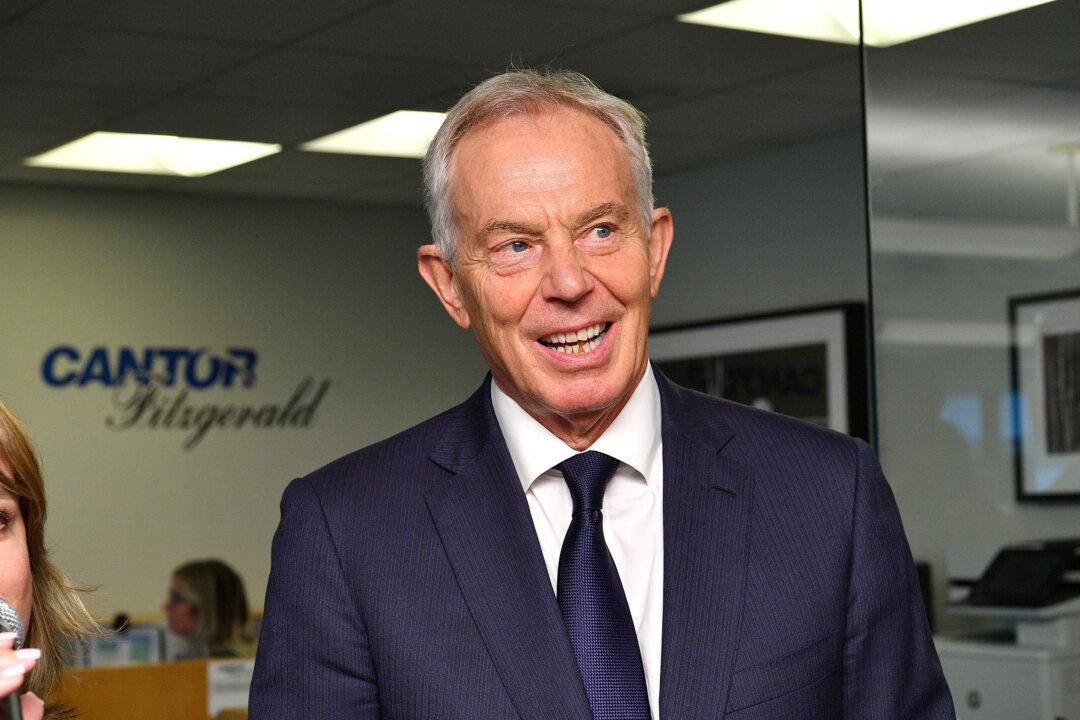 A British Prime Minister’s Failed Policies Are a Gold Mine for His Son