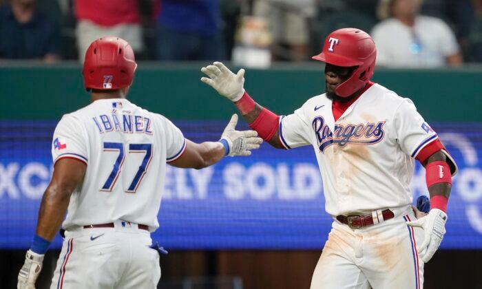 Garcia Sets Rookie HR Record in 7-6 Rangers Win Over Angels