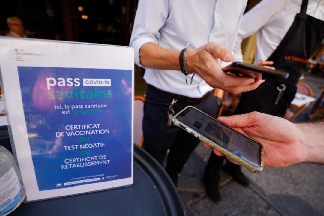 French Lower House Approves Macron’s Stricter ‘Vaccine Passport’ After Tumultuous Debate