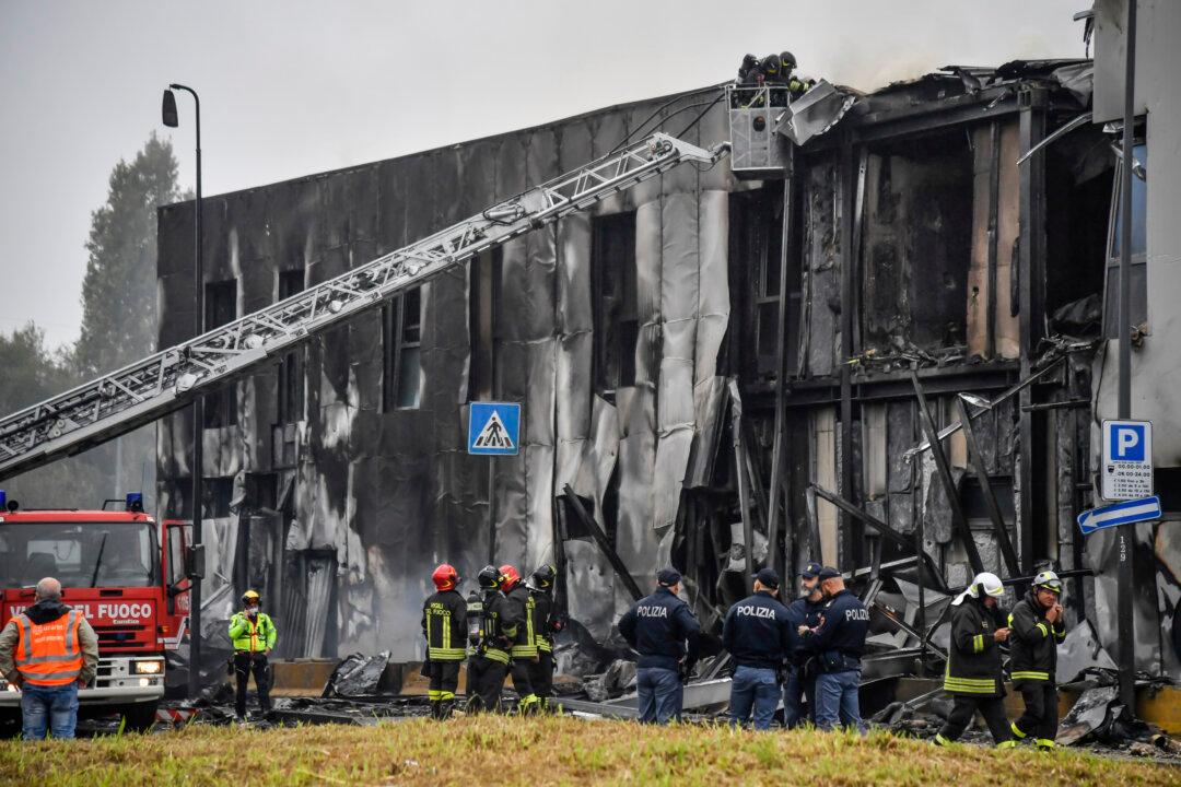 Plane Crashes Into Building Near Milan; All 8 Aboard Die