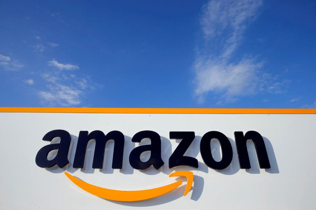 Amazon Sued by Warehouse Workers Over COVID-19 Screening Pay