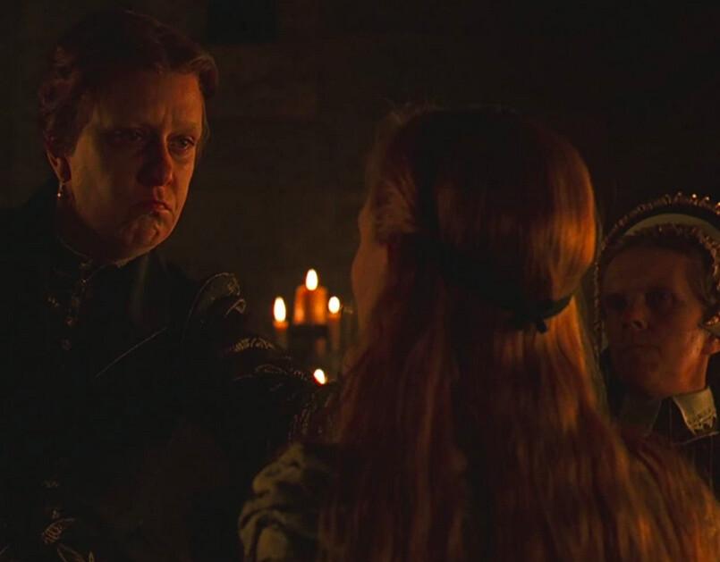 (L–R) Catholic Queen "Bloody Mary" (Kathy Burke), future Queen Elizabeth I (Cate Blanchett), and Mary's dwarf (Valerie Gale) in Mary's chambers, in “Elizabeth.” (PolyGram Filmed Entertainment)