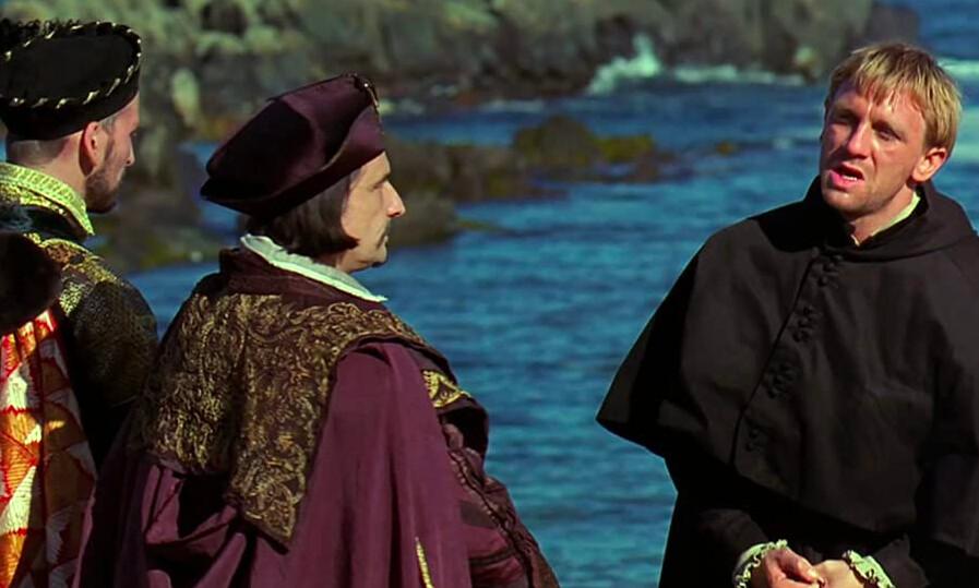(L–R) The Duke of Norfolk (Christopher Eccleston), Norfolk's man (Liam Foley), and Catholic priest John Ballard (Daniel Craig) meet in secret to discuss the overthrow of Queen Elizabeth, in “Elizabeth.” (PolyGram Filmed Entertainment)