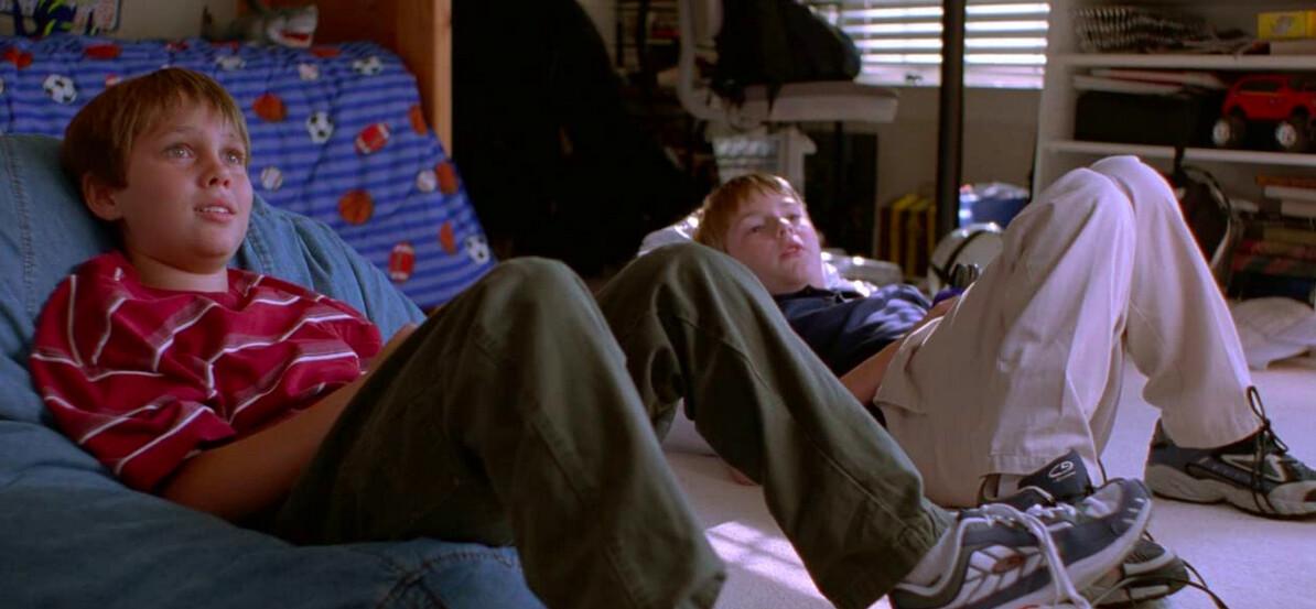 Mason Evans Jr. (Ellar Coltrane, L) and Bill Welbrock (Marco Perella) play video games, in Richard Linklater’s “Boyhood.”(IFC Films/Universal Pictures)