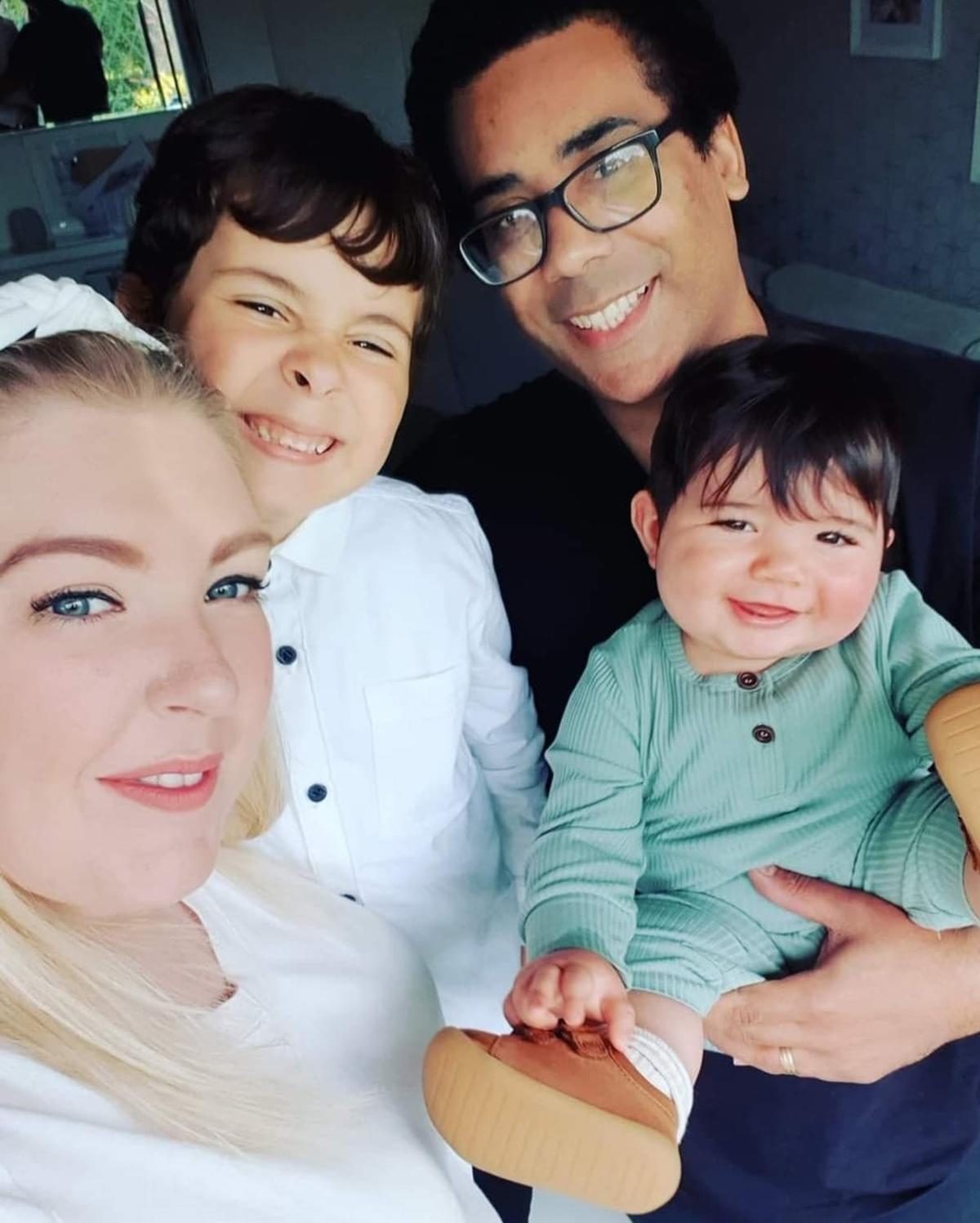 Vicky and her husband, Simon, with their two sons, Roman and baby Reign. (Courtesy of Caters News)