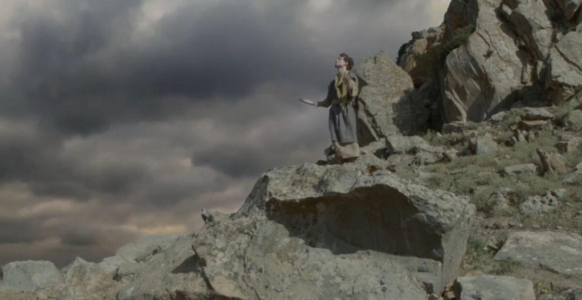 David (Miles Sloman) prays to God before facing Goliath in “David and Goliath.” (RiverRain Productions)