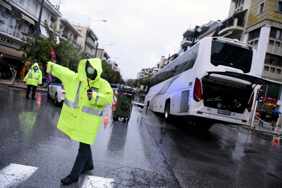 Bus Tips Into Sinkhole as Deadly Storms Lash Greece