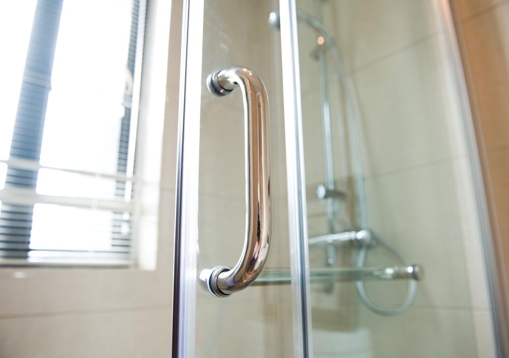 One reader discovered that WD-40 worked wonders on stained shower doors. (hxdbzxy/Shutterstock)