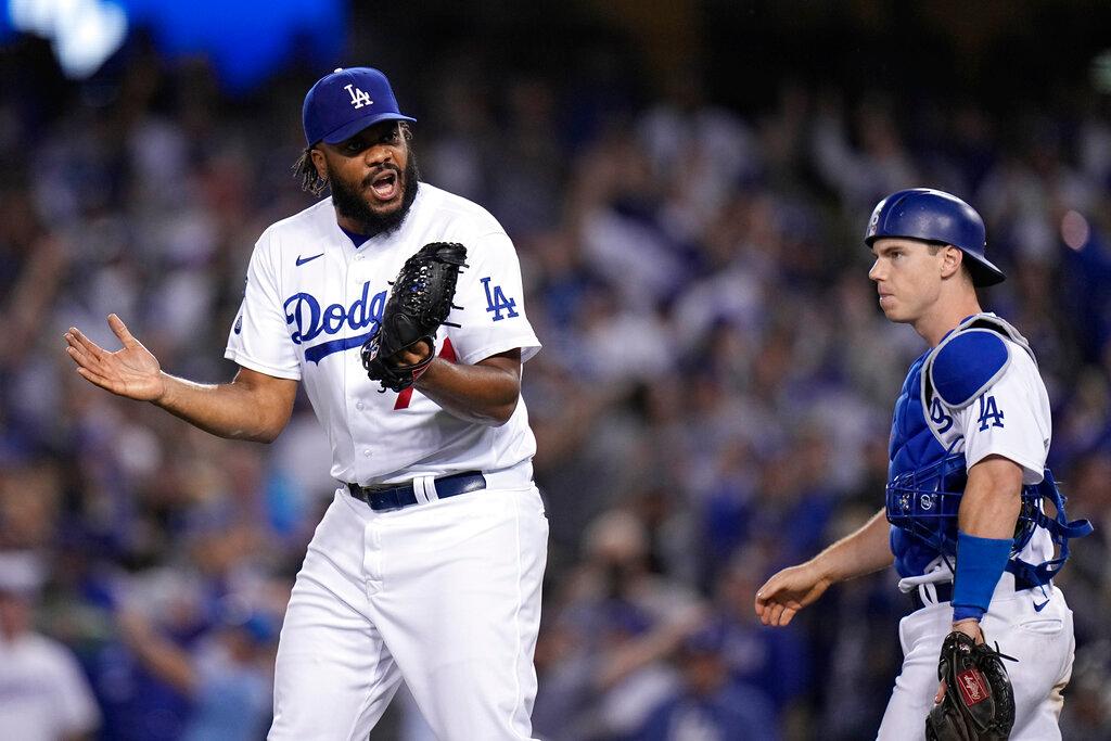 Los Angeles Dodgers pitcher Kenley Jansen reacts after getting the final out in the ninth inning against the Atlanta Braves in Game 3 of baseball's National League Championship Series in Los Angeles on Oct. 19, 2021. (Jae Hong/AP Photo)