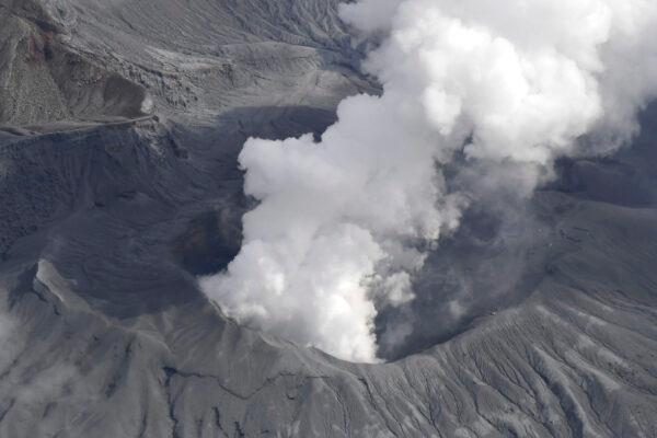Smoke rises from a crater of Mr. Aso, Kumamoto prefecture, southwestern Japan, on Oct. 20, 2021. (Kyodo News via AP)