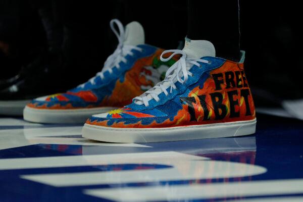 Detail of the shoes worn by Enes Kanter of the Boston Celtics with the wording "Free Tibet" during the first half against the New York Knicks at Madison Square Garden in New York City, N.Y., on Oct. 20, 2021. (Sarah Stier/Getty Images)