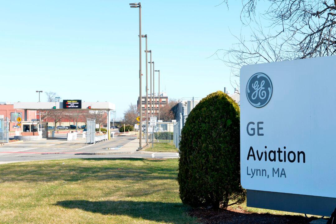 Chinese Agent Accused of Recruiting Spies to Steal US Aircraft Tech Stands Trial