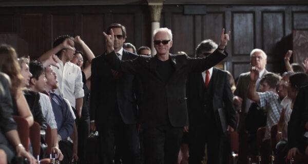 Satan (Malcolm McDowell) arrives in “Suing the Devil”. (Mouthwatering Productions)