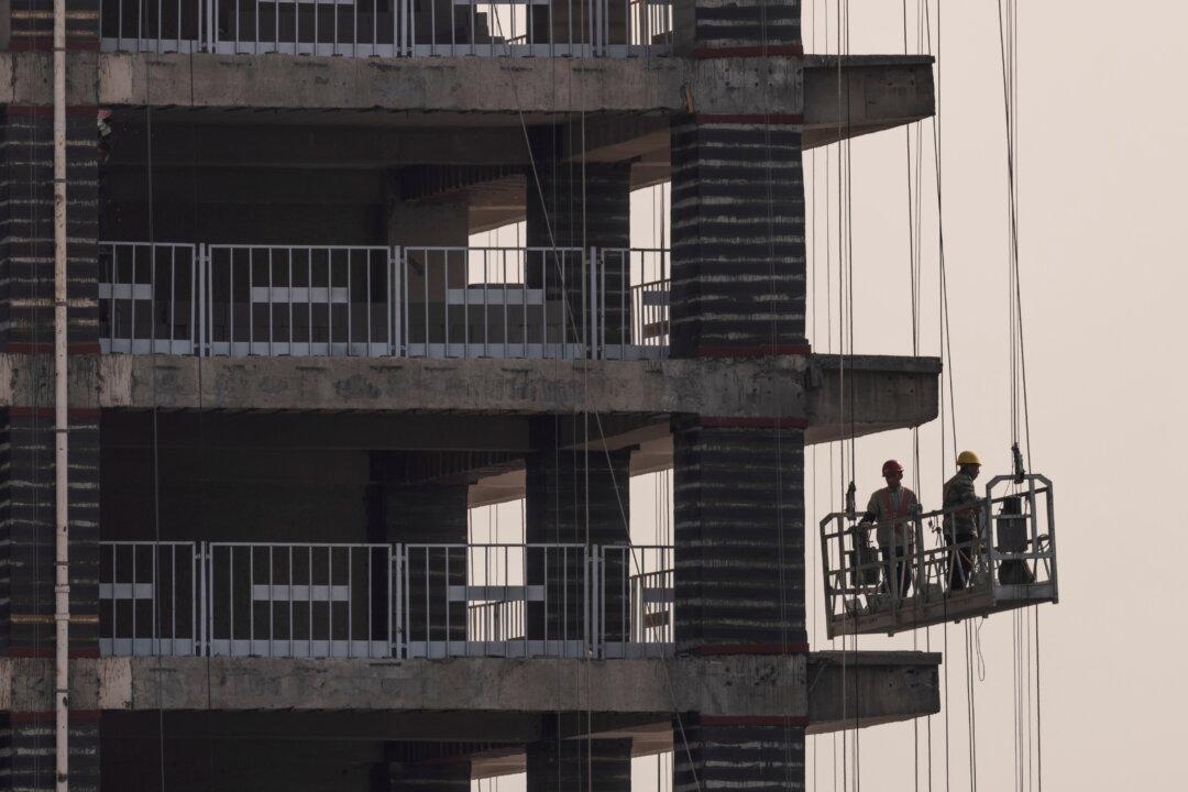 China’s Modern Land Misses Bond Payment, Property Shares Drop