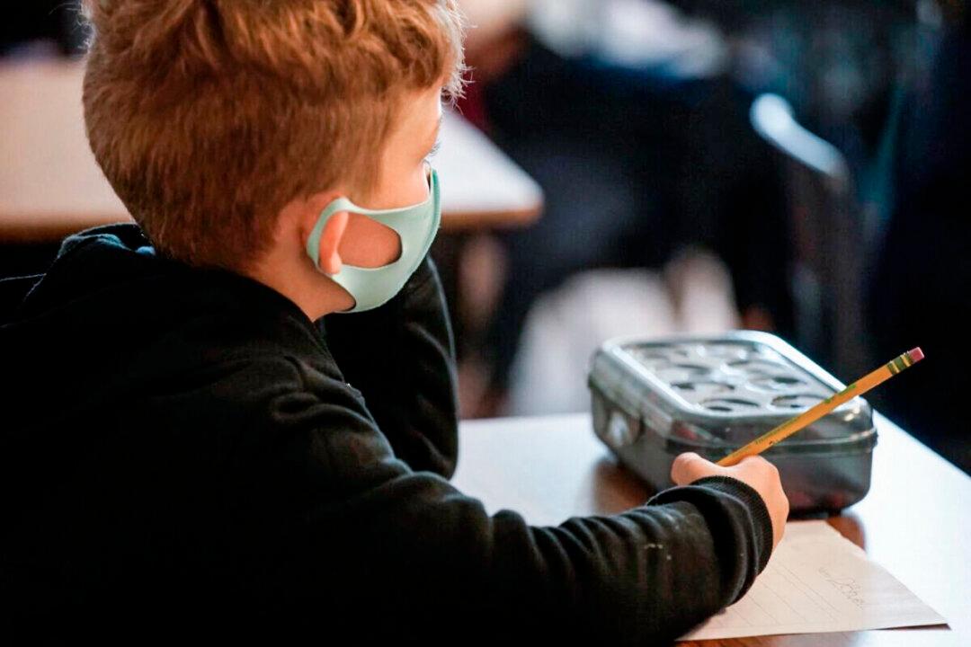 Top Former Rhode Island Health Official Unaware of Key Studies on Masking, Child Transmission