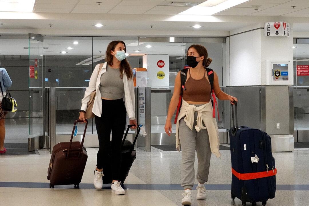 Omicron Variant Threatening Economic Recovery Amid New Travel Restrictions