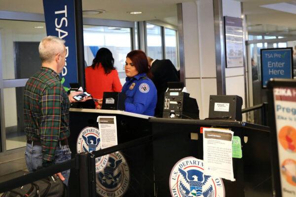People are screened by the TSA at LaGuardia Airport, New York City, on Jan. 25, 2019. (Spencer Platt/Getty Images)