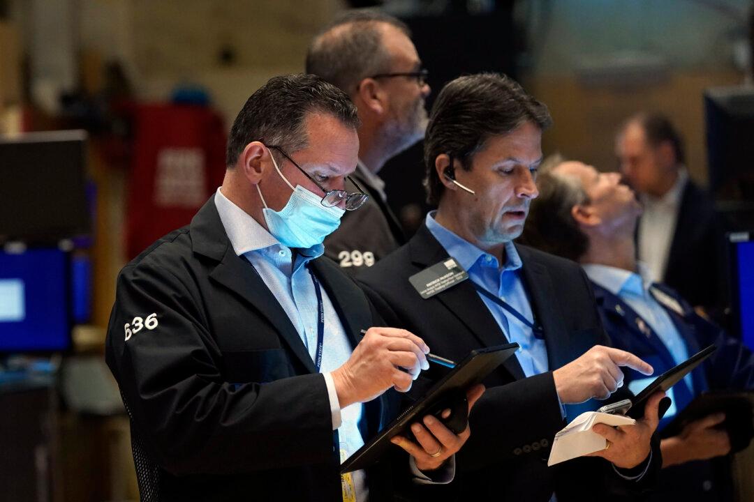 Stocks Gain, Pushing the Dow Jones Industrials Over 36,000