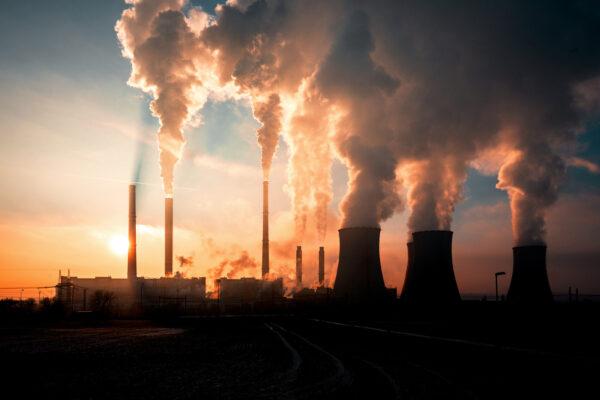 A coal-fired power station at sunset in Pocerady, Czech republic. (kamilpetran/Adobe Stock)
