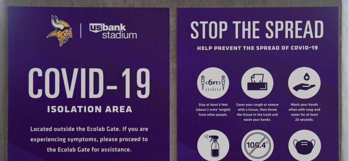 COVID-19 signage is posted inside the arena before the game between the Minnesota Vikings and the Green Bay Packers at U.S. Bank Stadium on September 13, 2020, in Minneapolis, Minnesota. (Hannah Foslien/Getty Images)