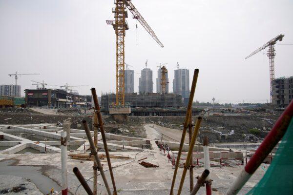 A crane stands at the construction site of Evergrande Cultural Tourism City, a China Evergrande Group project that has seen construction halted, in Suzhou's Taicang, Jiangsu Province, China, on Oct. 22, 2021. (Aly Song/Reuters)