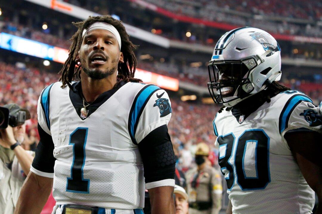 Superman’s Sequel: Newton Leads Panthers Over Cards 34–10