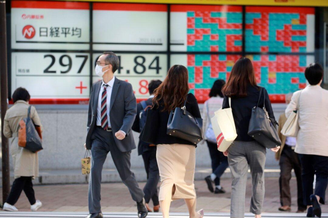 Asian Shares Higher as Japan Says Economy Shrank in Third Quarter