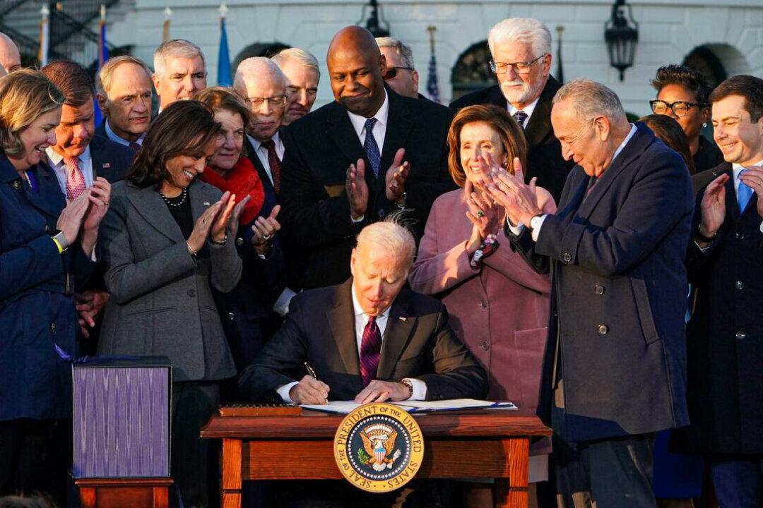 Biden Signs $1.2 Trillion Infrastructure Bill in Bipartisan Ceremony