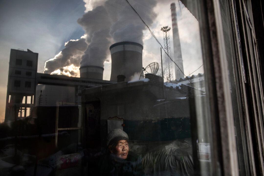 ANALYSIS: Beijing’s Emissions Commitment Being Questioned as Kerry Holds Climate Talks in China
