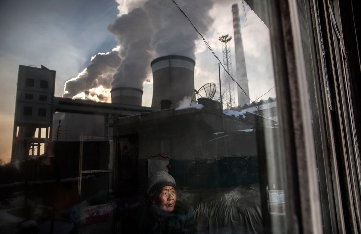 ANALYSIS: Beijing’s Emissions Commitment Being Questioned as Kerry Holds Climate Talks in China