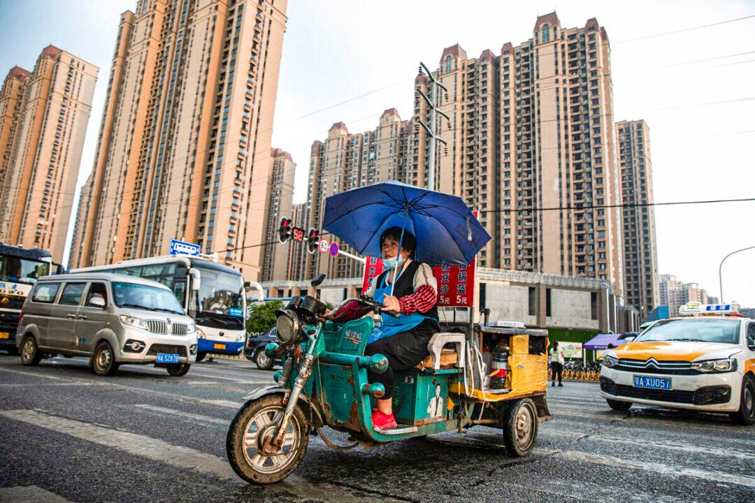 China’s Real Estate Woes: Collapse or Temporary Setback?