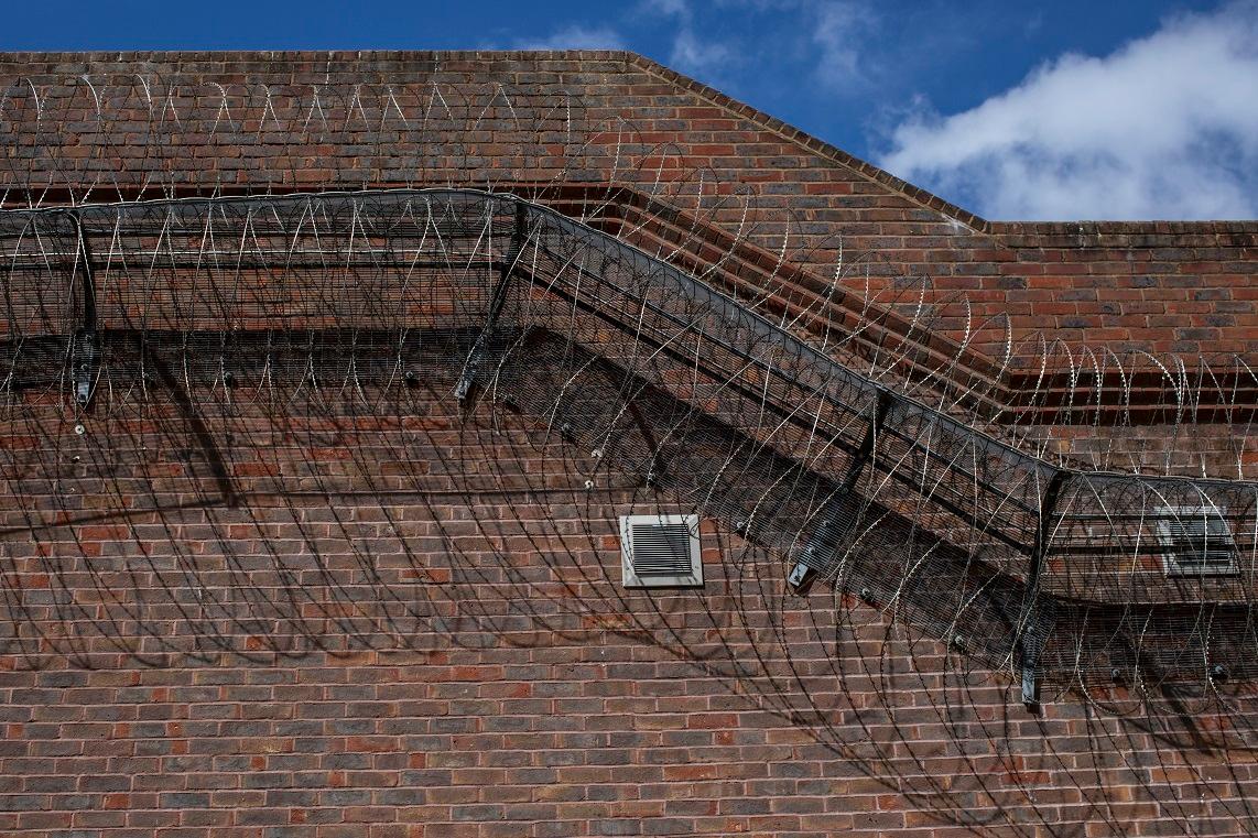 Job Ad With Real White Prison Officer and Black Inmate Banned for Depicting ‘Negative Racial Stereotype’