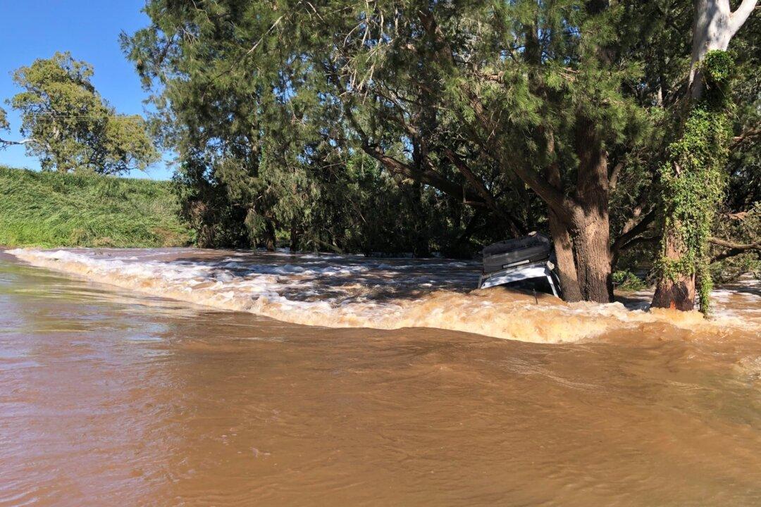 Major Flooding in Australia Kills Two Men and Forces Hundreds to Flee