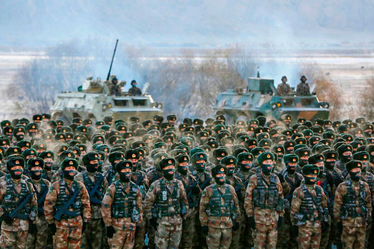 Chinese Army soldiers assembling during military training at the Pamir Mountains in Kashgar, northwestern China's Xinjiang region on Jan. 4, 2021. (STR/AFP via Getty Images)