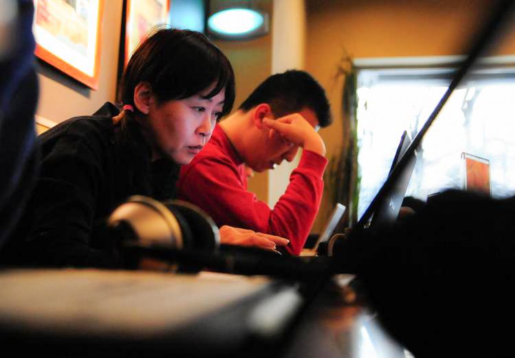According to the 2007 Annual Report on China's Internet Network, the struggle for free online access by everyday Chinese Internet users is getting more desperate as the Chinese Communist regime has stepped up its control on the Internet. (Frederic J. Brown/AFP/Getty Images)