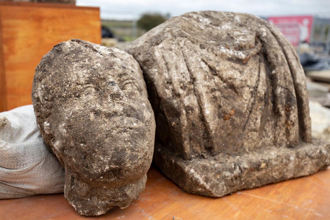 Archaeologists Uncover Ancient Roman Statues Under Norman Village Church in England