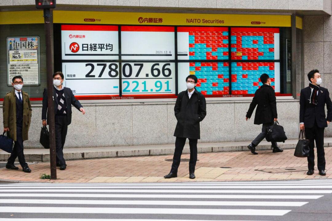 World Shares Mixed Amid Troubles for Chinese Property Sector