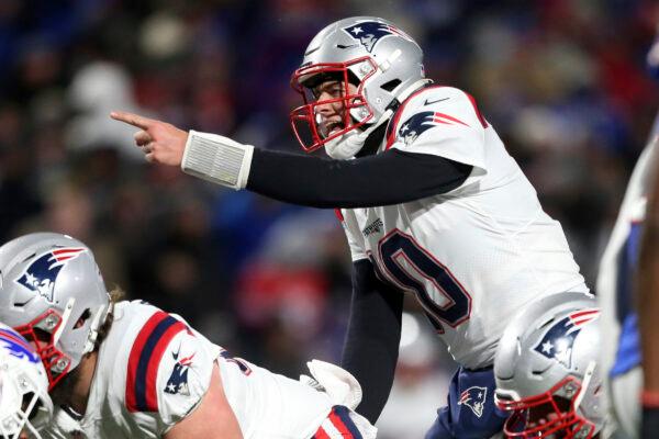 New England Patriots quarterback Mac Jones (10) calls signals during the second half of an NFL football game against the Buffalo Bills in Orchard Park, N.Y., on Dec. 6, 2021. (Joshua Bessex/AP Photo)