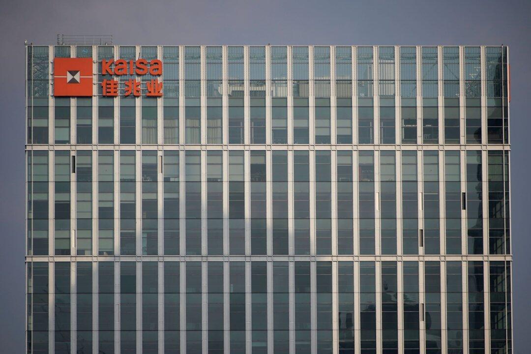 Evergrande, Kaisa Cut by Fitch to ‘Default’ After Missed Payment Deadlines