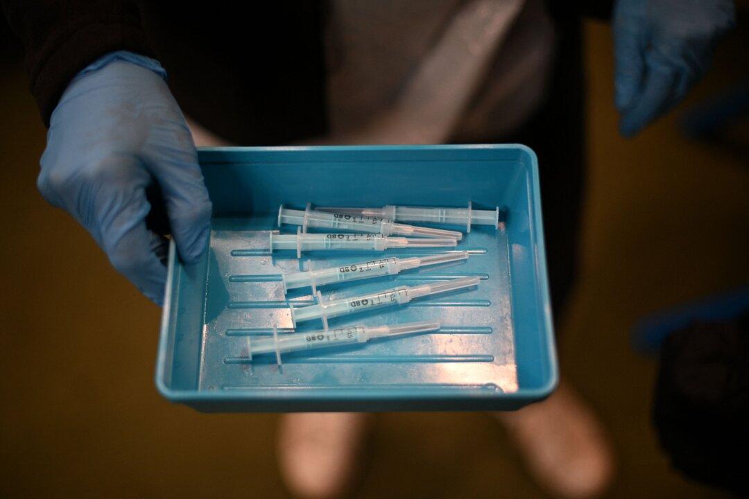 Researcher Calls Out Censorship After Journal Pulls COVID-19 Vaccine Adverse Events Analysis