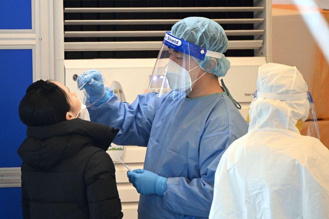 South Korea Tightens COVID-19 Measures as Surge in Infections Overwhelms Hospitals